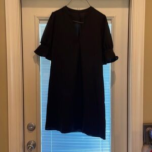 NEW! Black ruffle sleeve dress.